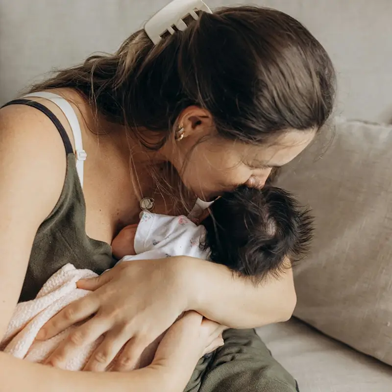 Mom holding newborn baby